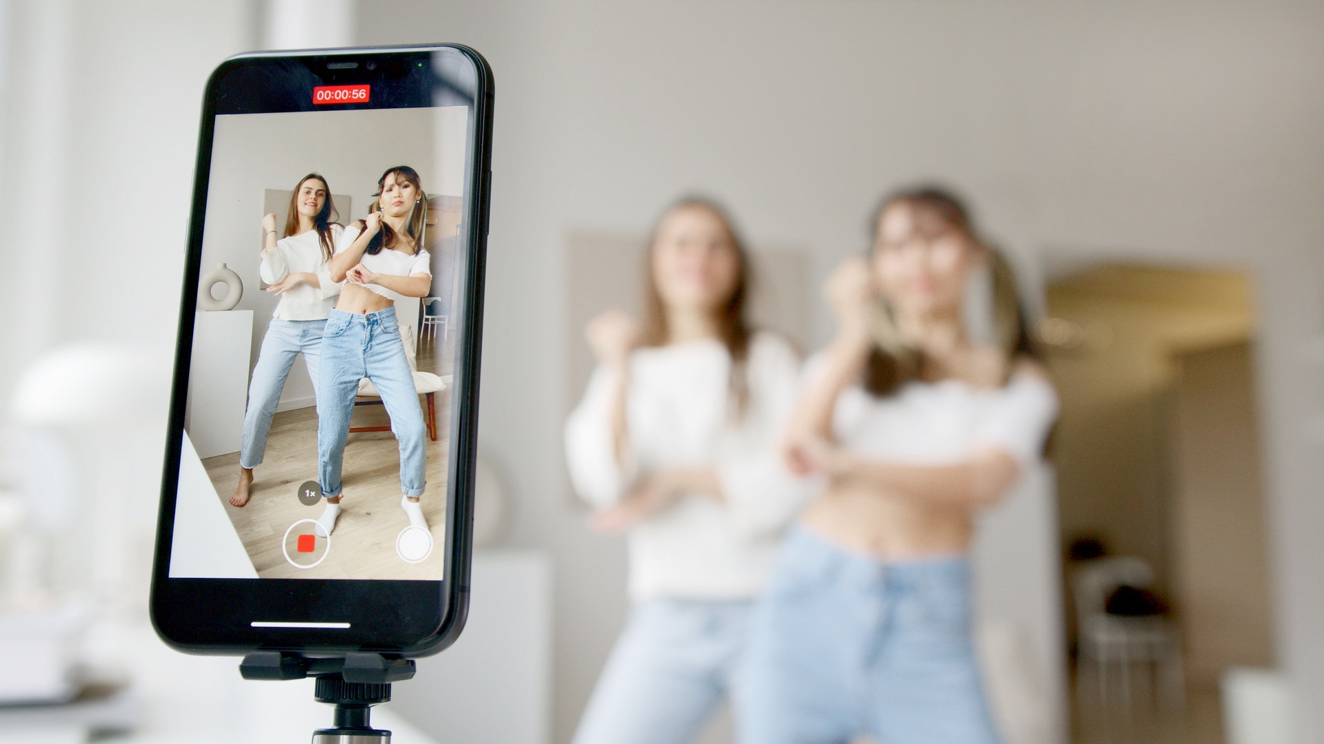 Two girls doing TikTok dance