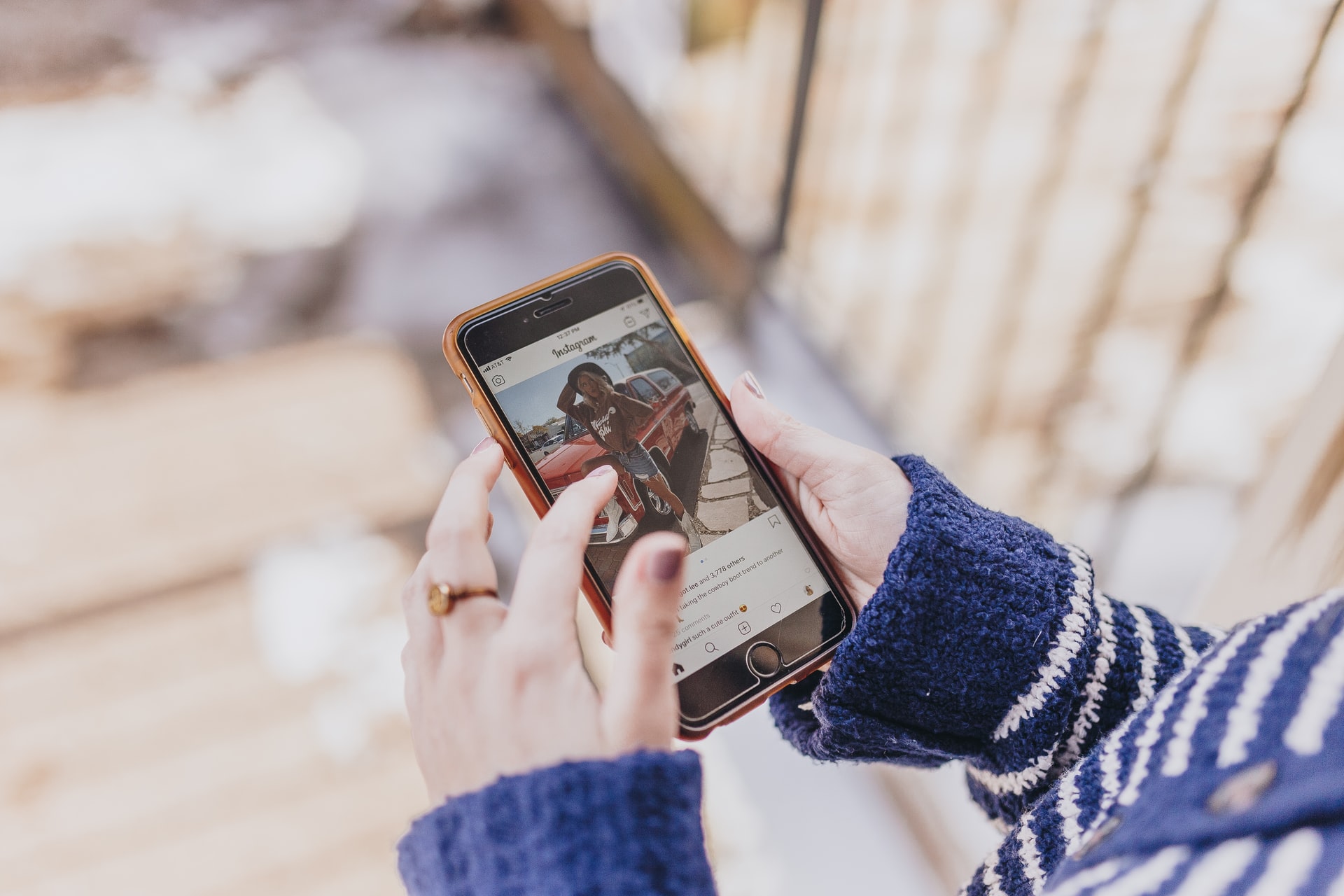 person looking through instagram photos