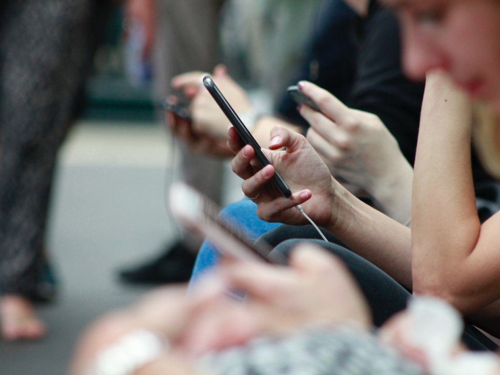 People holding phones